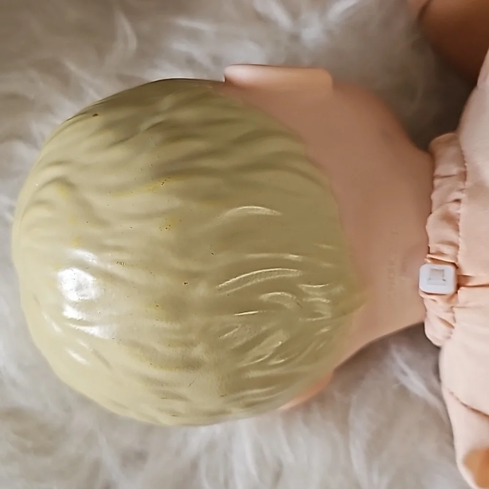 2 cute soft body dolls blonde hair and dark